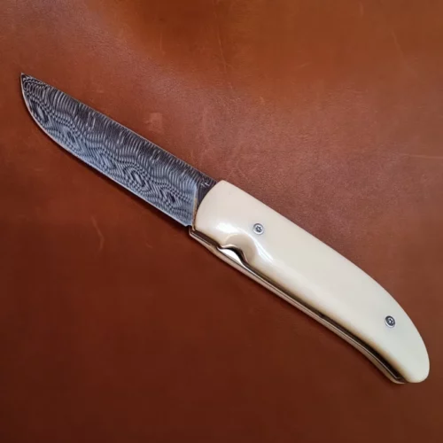 couteau pliant en palissandre et noyer